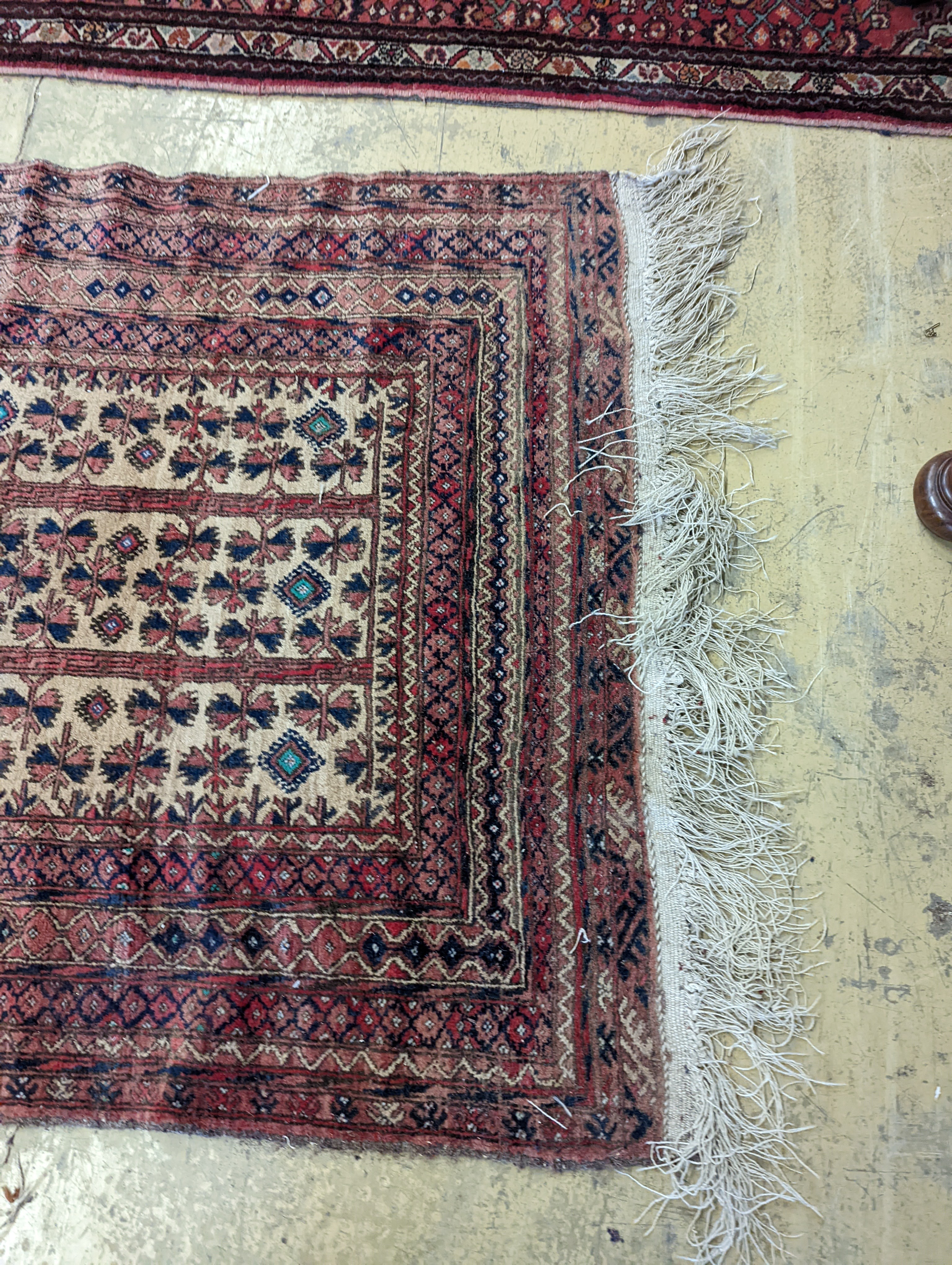 An antique Caucasian runner and a Belouch rug, larger 284 x 134cm
